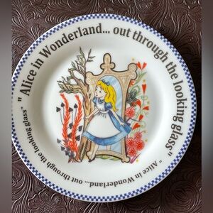 Twin Alice in Wonderland plates.  One in and one out of the looking glass.